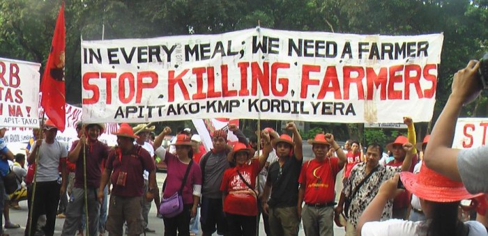 Boer.inn.en in de regio Cordillera protesteren tegen de moorden op hun collega's. (Foto: Kilusang Magbubukid ng Pilipinas – de Filipijnse boerenbeweging)