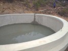 Vullen van watertank in Trigales